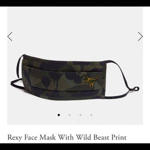 Brand New, never opened Coach Rexy Mask